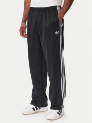 Adidas Spodnie dresowe adicolor Spacer KS7433 Czarny Baggy Fit. Czarne spodnie dresowe męskie Adidas, bez wzorów, z bawełny. Za 349.99 zł.