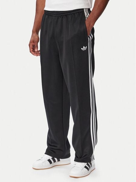 Adidas Spodnie dresowe adicolor Spacer KS7433 Czarny Baggy Fit. Czarne spodnie dresowe męskie Adidas, bez wzorów, z bawełny. Za 349.99 zł.
