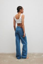 Spodnie o prostym kroju w kolorze BLUE - REFLECT-XS. Niebieskie spodnie materiałowe damskie Marsala, bez wzorów, z denimu, eleganckie. Za 459.90 zł.