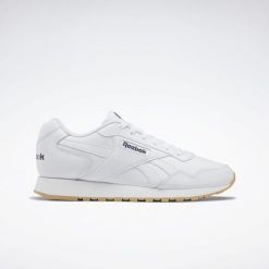 Trampki Męskie Skóra Glide. Czarne trampki i tenisówki męskie Reebok, bez wzorów, z gumy, bez zapięcia. Za 189.00 zł.