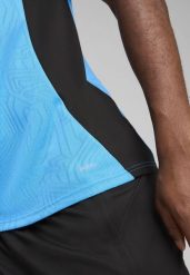 Męska koszulka treningowa Olympique Marsylia PUMA Bleu Azur Copper Blue Metallic. Niebieskie t-shirty sportowe męskie Puma, m, z żakardem, bez ramiączek, do piłki nożnej. Za 215.75 zł.