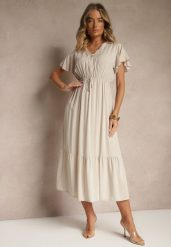 Beżowa Rozkloszowana Sukienka z Bawełny Zdobiona Guzikami Folennea. Brązowe sukienki damskie Renee, na co dzień, l, z aplikacjami, z bawełny, eleganckie, bez kołnierzyka, bez ramiączek, midi, rozkloszowane. W wyprzedaży za 59.49 zł.