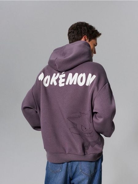 Bluza hoodie z nadrukiem Pokemon - fioletowy. Fioletowe bluzy bez kaptura męskie Sinsay, l. Za 79.99 zł.
