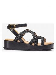 Unisa Skórzane sandały w kolorze czarnym na koturnie rozmiar: 40. Czarne sandały damskie Unisa, bez wzorów, bez obcasa, na koturnie. Za 304.99 zł.