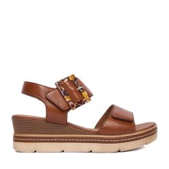 Sandały Remonte. Brązowe sandały damskie Remonte, bez wzorów, bez obcasa, na koturnie. Za 379.99 zł.