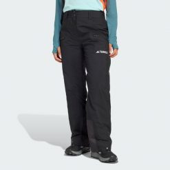 Ocieplane spodnie Terrex Multi 2 Layer CLIMAPROOF. Czarne spodnie materiałowe damskie Adidas, bez wzorów. Za 899.00 zł.