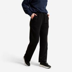 Spodnie damskie Domyos essential. Czarne spodnie sportowe damskie DOMYOS, l, z materiału, na fitness i siłownię. Za 69.99 zł.