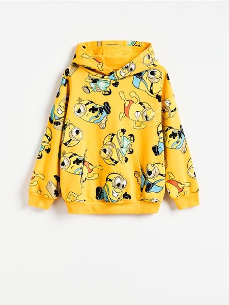 Bluza Minionki - żółty. Żółte bluzy i bluzki niemowlęce Reserved, bez wzorów, z bawełny, bez ramiączek, bez kaptura. Za 69.99 zł.