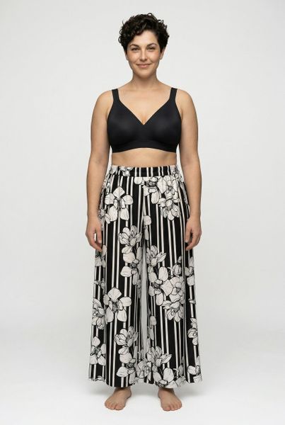 Damskie Spodnie palazzo paski z motywem kwiatów szeroka nogawka elastyczny pas. Czarne spodnie materiałowe damskie Ulla Popken, bez wzorów, z materiału, plus size. Za 191.99 zł.
