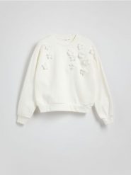 Bawełniana bluza z aplikacją - kremowy. Białe bluzy bez kaptura damskie Reserved, l, z bawełny. W wyprzedaży za 69.99 zł.