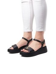 U.S. Polo Assn. Sandały w kolorze czarnym na koturnie rozmiar: 37. Czarne sandały damskie U.S. Polo Assn., bez wzorów, bez obcasa, na koturnie. Za 217.99 zł.