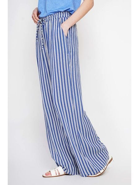 Le Jardin du Lin Spodnie w kolorze niebieskim rozmiar: 42. Niebieskie spodnie materiałowe damskie Le jardin du lin, bez wzorów, z materiału, z podwyższonym stanem. Za 100.99 zł.