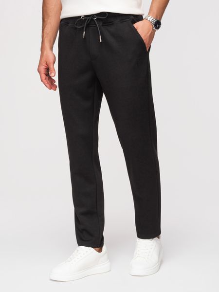 Męskie spodnie dresowe z prostą nogawką z gładkiej dzianiny - czarne V1. Czarne spodnie dresowe męskie Ombre Clothing, bez wzorów, z dresówki. Za 229.99 zł.