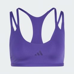 Biustonosz z lekkim wsparciem do ćwiczeń Optimé z paskami z tyłu. Fioletowe biustonosze Adidas, bez wzorów, z elastanu. Za 219.00 zł.
