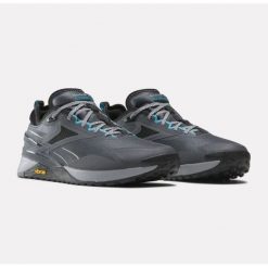 Buty Reebok Nano X3 Adventure 100074533 szare. Szare buty sportowe na co dzień męskie z materiału, bez zapięcia. Za 774.59 zł.