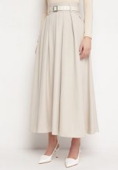 Jasnobeżowa Spódnica o Rozkloszowanym Plisowanym Fasonie z Paskiem z Klamrą Aferna. Brązowe spódniczki damskie Born2be, m, bez wzorów, eleganckie, maxi, plisowane. Za 169.99 zł.