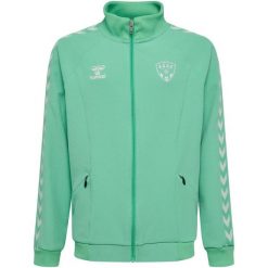 Kurtka Travel zippée ASSE 2026/27. Zielone kurtki treningowe męskie HUMMEL, s, bez wzorów, z materiału, na fitness i siłownię. Za 378.50 zł.