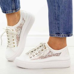 Białe przewiewne trampki damskie Lee Cooper 4480. Białe trampki i tenisówki damskie Lee Cooper, bez wzorów, z jeansu. Za 159.00 zł.