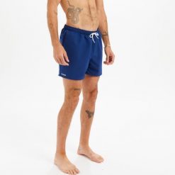 Spodenki surfingowe męskie Olaian Hendaia NT. Niebieskie kąpielówki męskie OLAIAN, m, bez wzorów, z materiału. Za 19.99 zł.