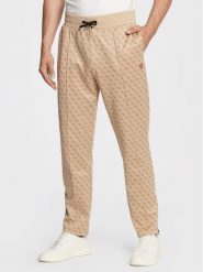 Guess Spodnie dresowe Korbin Z2BB05 FL04Q Beżowy Regular Fit. Brązowe spodnie dresowe męskie Guess, z aplikacjami, z dresówki. Za 389.99 zł.