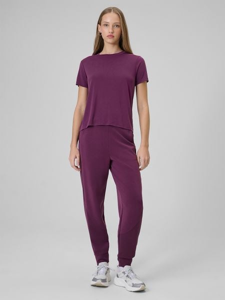 4F Spodnie dresowe z modalem joggery damskie - fioletowe XL. Czerwone spodnie dresowe damskie 4f, xl, bez wzorów, z dresówki. Za 189.99 zł.