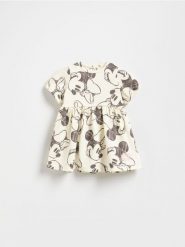 Sukienka Minnie Mouse - złamana biel. Sukienki dziewczęce Reserved, bez wzorów, z bawełny, bez ramiączek. Za 45.99 zł.