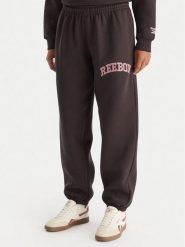 Reebok Spodnie dresowe Marvs RK25165CCW Czarny Regular Fit. Czarne spodnie dresowe damskie Reebok, l, bez wzorów, z dresówki. Za 199.99 zł.