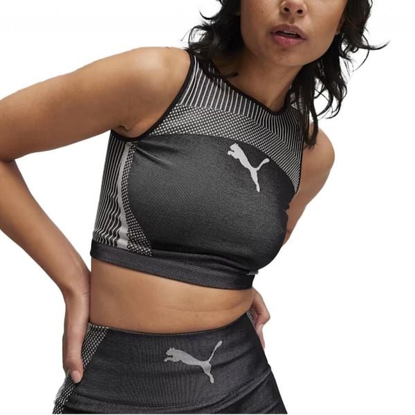 Koszulki Puma Model To Crop Top Kolor Czarny. Czarne bluzki sportowe damskie Puma, bez wzorów, z tkaniny, bez kołnierzyka. W wyprzedaży za 154.00 zł.