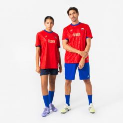 Koszulka piłkarska Czechy 2026 dla kibiców. Czerwone bluzki damskie KIPSTA, xl, bez wzorów, z materiału, sportowe, bez kołnierzyka, bez ramiączek. Za 44.99 zł.