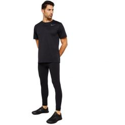 Koszulka treningowa męska Nike Breathe Vent T-Shirt. Czarne t-shirty męskie Nike, m, z poliesteru, bez ramiączek, do piłki nożnej. Za 79.00 zł.