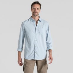 Koszula podróżnicza męska Craghoppers NosiLife Nuoro LS Shirt II. Niebieskie koszule męskie CRAGHOPPERS, m, bez wzorów, bez kołnierzyka, bez ramiączek. Za 324.99 zł.