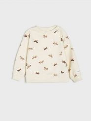 Bluza - kremowy. Białe bluzy i bluzki niemowlęce Sinsay, bez wzorów, z bawełny, bez ramiączek, bez kaptura. W wyprzedaży za 9.99 zł.