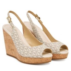 Sandały MICHAEL Michael Kors. Białe sandały damskie MICHAEL Michael Kors, bez wzorów, bez obcasa, na koturnie. Za 699.99 zł.