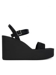 Calvin Klein Sandały Wedge 70 Sndl Webbing Lth HW0HW02882 Czarny. Czarne sandały damskie CALVIN KLEIN, bez wzorów, z materiału, bez obcasa, na koturnie. Za 449.99 zł.