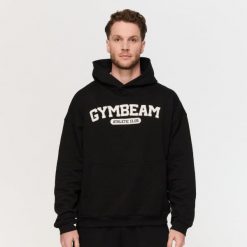 Bluza męska fitness z kapturem czarna Varsity. Czarne bluzy sportowe męskie GYMBEAM, bez wzorów, z bawełny, bez kołnierzyka, bez ramiączek. Za 139.90 zł.