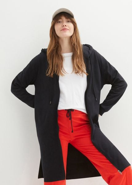 Długa bluza rozpinana z rozcięciami po bokach. Czarne bluzy z kapturem damskie bonprix. Za 149.99 zł.