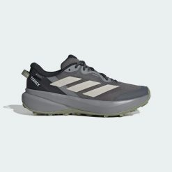 Buty do biegów przełajowych Terrex Tracefinder Plus GORE-TEX. Brązowe obuwie do biegania damskie Adidas. Za 529.00 zł.