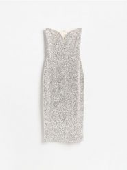 Cekinowa sukienka - srebrny. Szare sukienki damskie Reserved, l, bez wzorów, z dzianiny, bez kołnierzyka, bez ramiączek, dopasowane. Za 159.99 zł.