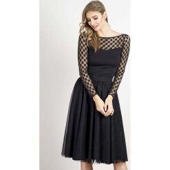 Czarna Zwiewna Tiulowa Spódnica do Kolan. Czarne bluzki damskie Molly.pl, l, bez wzorów, z tiulu, midi. Za 279.90 zł.