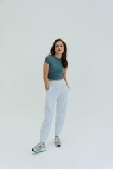 Koszulka treningowa do jogi Moonholi Timeless z krótkim rękawem. Szare bluzki sportowe damskie MOONHOLI, l, bez wzorów, z materiału, bez ramiączek. Za 189.00 zł.