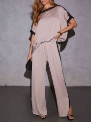 Milan Kiss Spodnie w kolorze szarobrązowo-czarnym rozmiar: L. Brązowe spodnie materiałowe damskie Milan Kiss, bez wzorów, z materiału, z podwyższonym stanem. Za 130.99 zł.