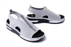 RIEKER V59B5-90 metallic, sandały damskie. Szare sandały damskie Rieker, bez wzorów, bez obcasa, na koturnie. Za 255.92 zł.