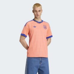 Bramkarska koszulka wyjazdowa Niemcy 26. Brązowe t-shirty sportowe męskie Adidas, l, z materiału, bez ramiączek, do piłki nożnej, climacool (adidas). Za 439.00 zł.