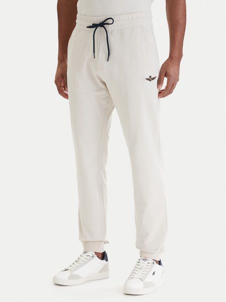 Aeronautica Militare Spodnie dresowe 261PF1008UF00674 Beżowy Regular Fit. Brązowe spodnie dresowe męskie AERONAUTICA MILITARE, bez wzorów, z bawełny. Za 399.99 zł.
