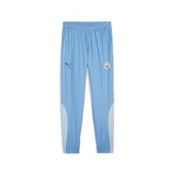 Spodnie d'avant-match PUMA Manchester City 23/24 Royal Blue Silver Sky. Niebieskie spodnie sportowe męskie Puma, z materiału. Za 271.85 zł.