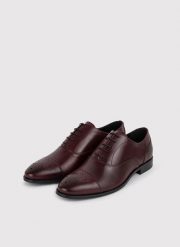 PAKO LORENTE – Bordowe buty męskie typu brogsy. Czerwone buty wizytowe męskie Pako Lorente, ze skóry, bez zapięcia. Za 399.99 zł.