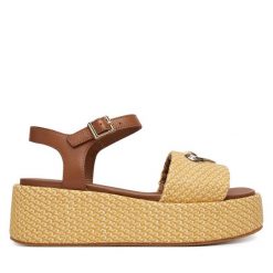 Sandały LOVE MOSCHINO. Brązowe sandały damskie Love Moschino, bez wzorów, bez obcasa, na koturnie. Za 939.99 zł.