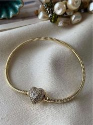 Luseera Pozłacana bransoletka z elementem ozdobnym rozmiar: onesize. Żółte bransoletki damskie Luseera, pozłacane. Za 65.99 zł.