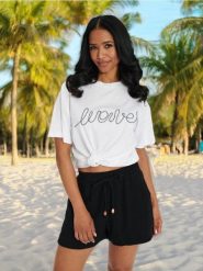 Koszulka - biały. Białe t-shirty damskie Sinsay, l, bez wzorów, z bawełny, bez kołnierzyka. Za 25.99 zł.