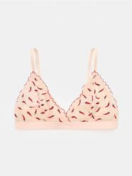 Biustonosz z haftem w papryczki na delikatnej siateczce z koronkowym wykończeniem - kremowy. Białe biustonosze Sinsay, bez wzorów, z koronki. Za 19.99 zł.